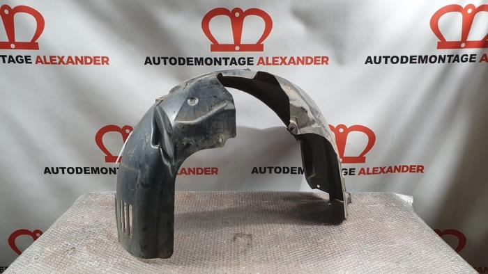 Wheel arch liner from a Ford Fiesta 6 (JA8) 1.6 TDCi 16V 95 2011