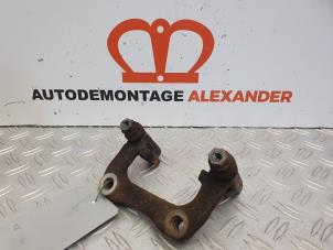Used Rear brake calliperholder, right Volkswagen Golf VI (5K1) 1.4 TSI 122 16V Price on request offered by Alexander Autodemontage