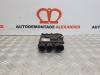Central door locking module from a Renault Megane III Grandtour (KZ) 1.4 16V TCe 130 2010