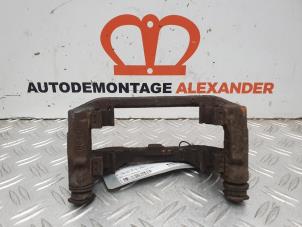 Used Front brake calliperholder, left Opel Corsa D 1.3 CDTi 16V ecoFLEX Price on request offered by Alexander Autodemontage
