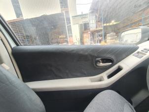 Usados Tapizado de puerta de 2 puertas izquierda Toyota Yaris II (P9) 1.3 16V VVT-i Precio de solicitud ofrecido por Alexander Autodemontage