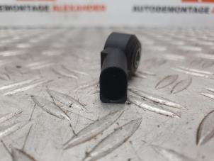 Klopfsensor van een Volkswagen Polo V (6R) 1.2 12V BlueMotion Technology 2012