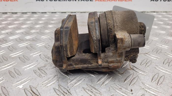 Front brake calliper, right from a Skoda Octavia Combi (5EAC) 1.6 TDI GreenTec 16V 2015
