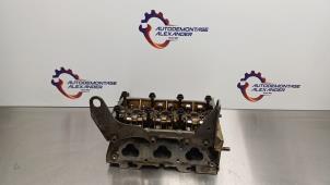 Used Cylinder head Volkswagen Polo V (6R) 1.2 12V BlueMotion Technology Price on request offered by Alexander Autodemontage