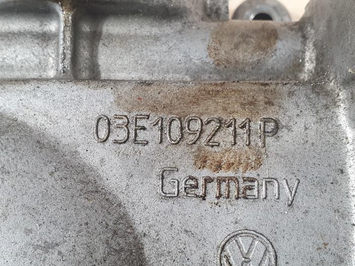 Timing cover from a Volkswagen Polo V (6R) 1.2 12V BlueMotion Technology 2011