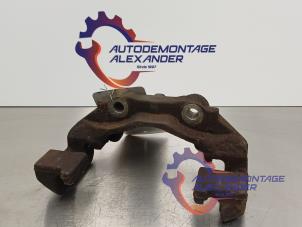 Used Front brake calliperholder, left Peugeot 3008 I (0U/HU) 1.6 HDiF 16V Price on request offered by Alexander Autodemontage