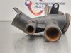 Thermostat housing from a Volkswagen Polo V (6R) 1.4 TDI DPF BlueMotion technology 2015