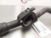 Thermostat housing from a Seat Altea (5P1) 2.0 TDI 16V 2005