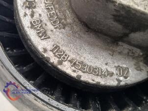 Spanrolle multiriem van een BMW 3 serie (E90) 325i 24V 2007