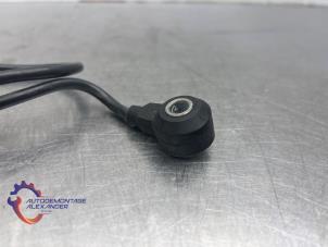 Klopfsensor van een BMW 3 serie (E90) 318i 16V 2010