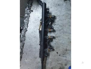Used Fuel injector nozzle Fiat Grande Punto (199) 1.2 Price on request offered by Autodemontage Atlas-Car B.V.