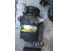 Air conditioning pump from a Opel Astra H (L48) 1.9 CDTi 100 2006