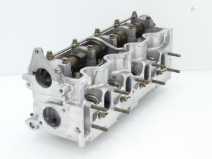 Used Cylinder head Fiat Bravo (182A) 1.9 TDS S,SX 75 Price € 242,00 Inclusive VAT offered by Brus Motors BV