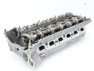 Used Cylinder head BMW 5 serie (E39) 520i 24V Price € 302,50 Inclusive VAT offered by Brus Motors BV