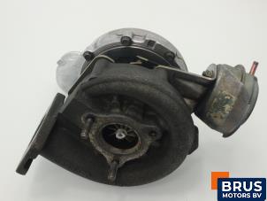 Turbo van een Audi A6 (C5) 2.5 TDI V6 24V 2004