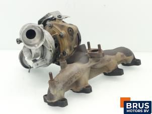 Turbo d'un Volkswagen Caddy Combi III (2KB,2KJ) 1.9 TDI 2009