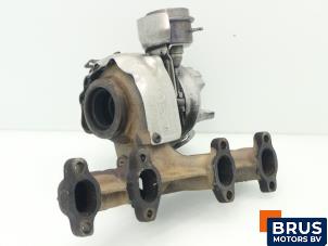 Turbo d'un Volkswagen Caddy Combi III (2KB,2KJ) 1.9 TDI 2009