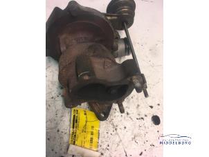 Turbo van een Renault Megane II Grandtour (KM) 1.5 dCi 80 2004