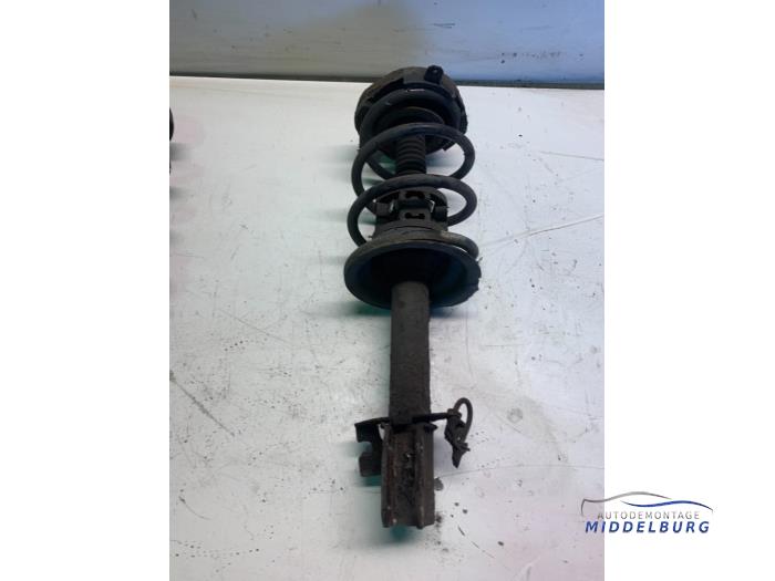 Shock absorber with coil spring