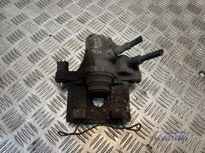 Rear brake calliper, left from a Ford Focus 2 Wagon 1.6 16V 2007