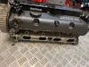 Cylinder head from a Ford Focus 1 Wagon 1.6 16V 2003