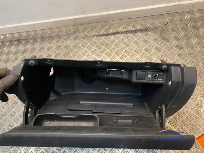 Glovebox from a Volkswagen Polo V (6R) 1.2 TDI 12V BlueMotion 2011