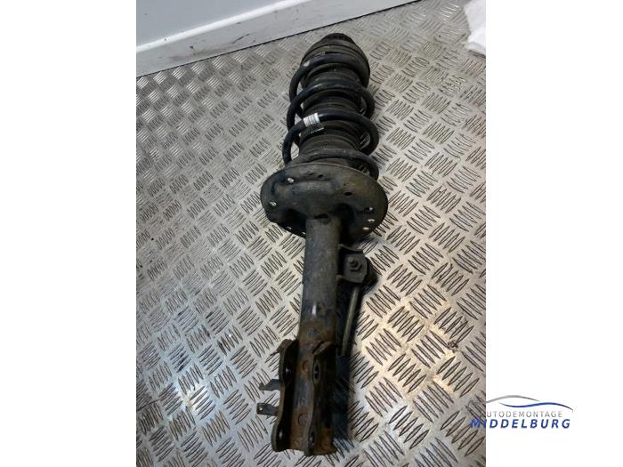 Front shock absorber rod, left from a Opel Corsa D 1.3 CDTi 16V ecoFLEX 2012