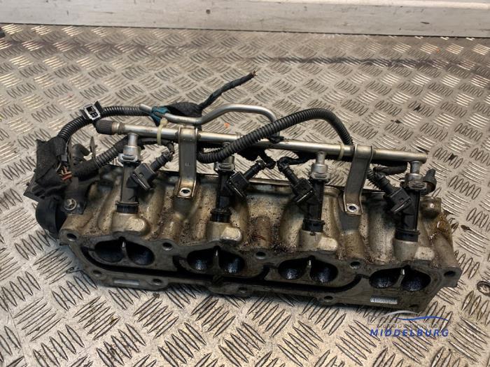 Intake manifold from a Opel Astra H (L48) 1.6 16V Twinport 2005