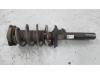Front shock absorber rod, right from a Volkswagen Caddy III (2KA,2KH,2CA,2CH) 1.6 TDI 16V 2013