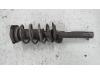 Front shock absorber rod, right from a Volkswagen Caddy III (2KA,2KH,2CA,2CH) 1.6 TDI 16V 2013