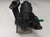 Oil filter housing from a Seat Leon (5FB) 1.6 TDI Ecomotive 16V 2015