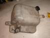 Front windscreen washer reservoir from a Alfa Romeo GTV (916) 2.0 16V Twin Spark 1997