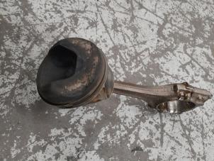 Piston from a Volkswagen Golf V (1K1) 2.0 FSI 16V 4Motion 2005