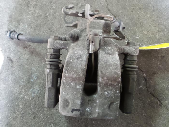 Rear brake calliper, left from a Alfa Romeo MiTo (955) 1.4 2012