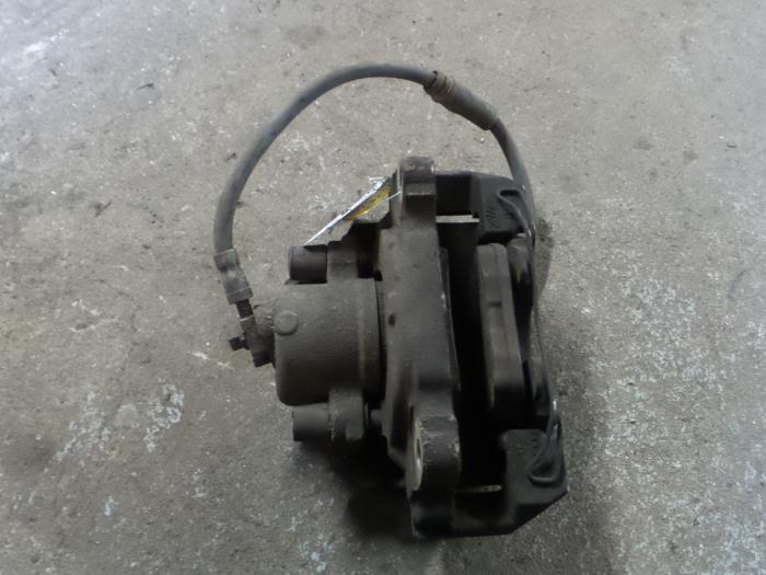 Front brake calliper, right from a Volkswagen Caddy III (2KA,2KH,2CA,2CH) 1.9 TDI 2008