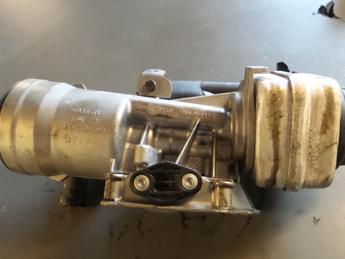 Oil filter housing from a Seat Ibiza III (6L1) 1.9 TDI 100 2008