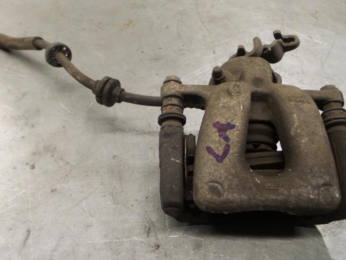 Rear brake calliper, left from a Alfa Romeo 159 Sportwagon (939BX) 2.0 JTDm 170 16V 2011