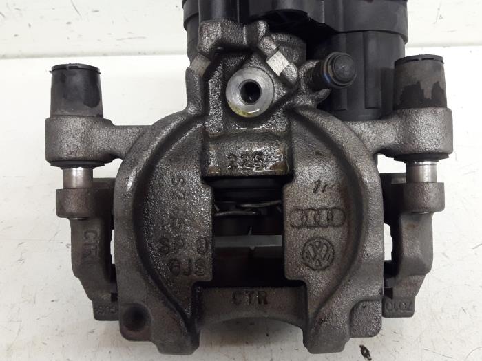 Rear brake calliper, left from a Audi A3 Limousine (8VS/8VM) 1.8 TFSI 16V 2015