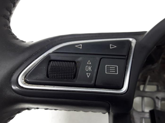 Steering wheel from a Audi A1 Sportback (8XA/8XF) 1.6 TDI 16V 2012
