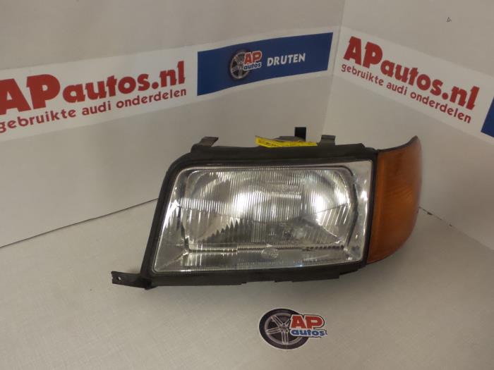 Używane Reflektor lewy Audi 100 Avant (C4) 2.3E 5E Cena € 19,99 Procedura marży oferowane przez AP Auto's