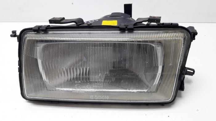 Headlight, left from a Audi 80 (B3) 1.8 1988