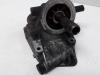 Oil filter holder from a Audi A6 Avant (C5) 1.9 TDI 130 2003