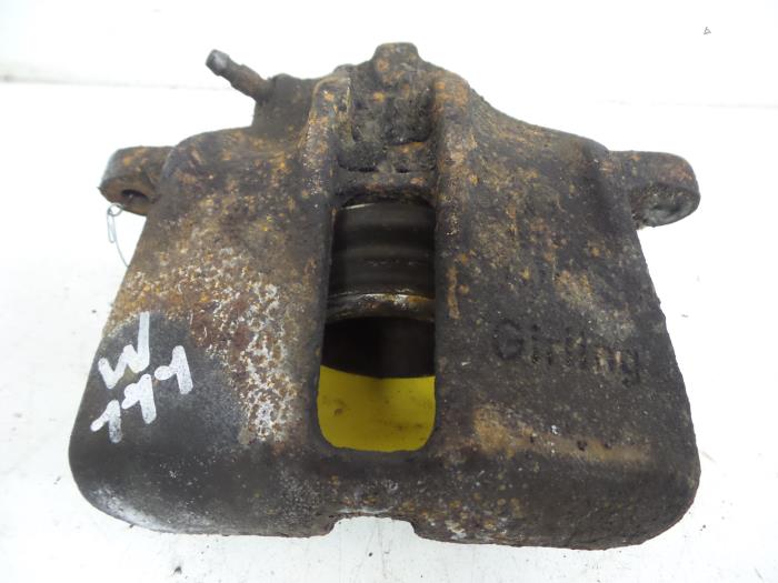Rear brake calliper, left from a Audi 80 (B3) 1.8 1987