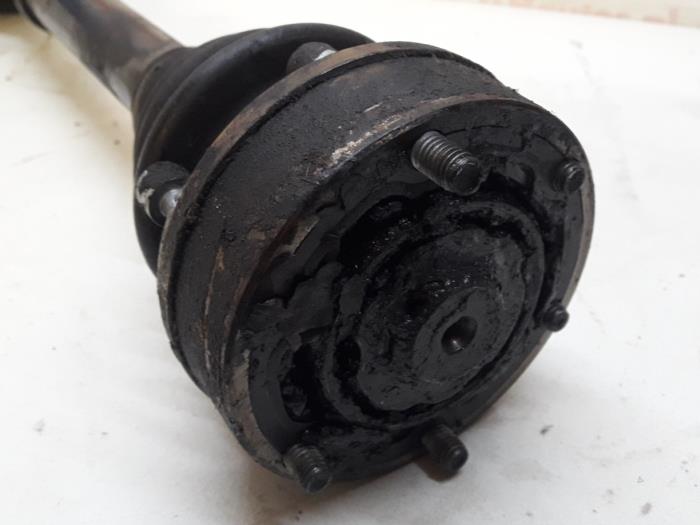 Front drive shaft, left from a Audi 80 Avant (B4) 2.0 E,S 1994