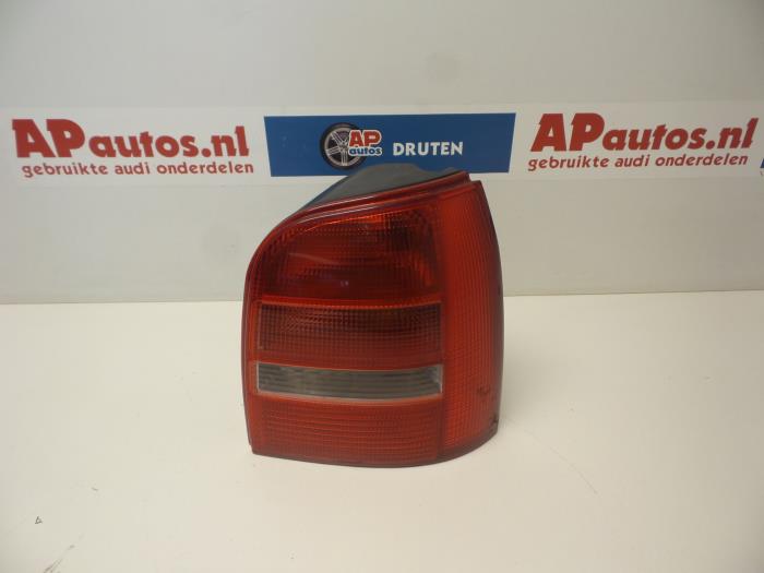 Tail light bulb cover holder