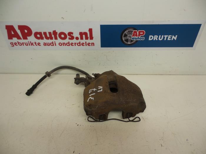 Front brake calliper, left from a Audi A4 (B7) 2.0 TDI 16V 2006