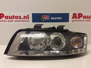 Używane Reflektor lewy Audi A4 (B6) 2.0 FSI 16V Cena € 50,00 Procedura marży oferowane przez AP Autos