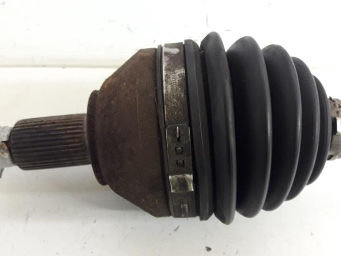 Front drive shaft, left from a Audi A1 Sportback (8XA/8XF) 1.2 TFSI 2012