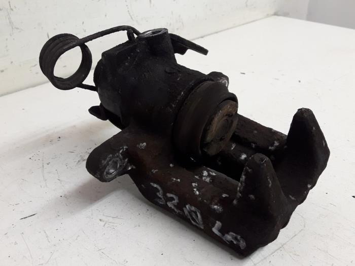 Rear brake calliper, left from a Audi A4 Avant (B5) 1.9 TDI 1999