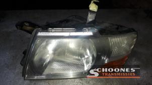 Używane Reflektor lewy Mitsubishi Pajero Cena € 42,00 Procedura marży oferowane przez Schoones Transmissies B.V.